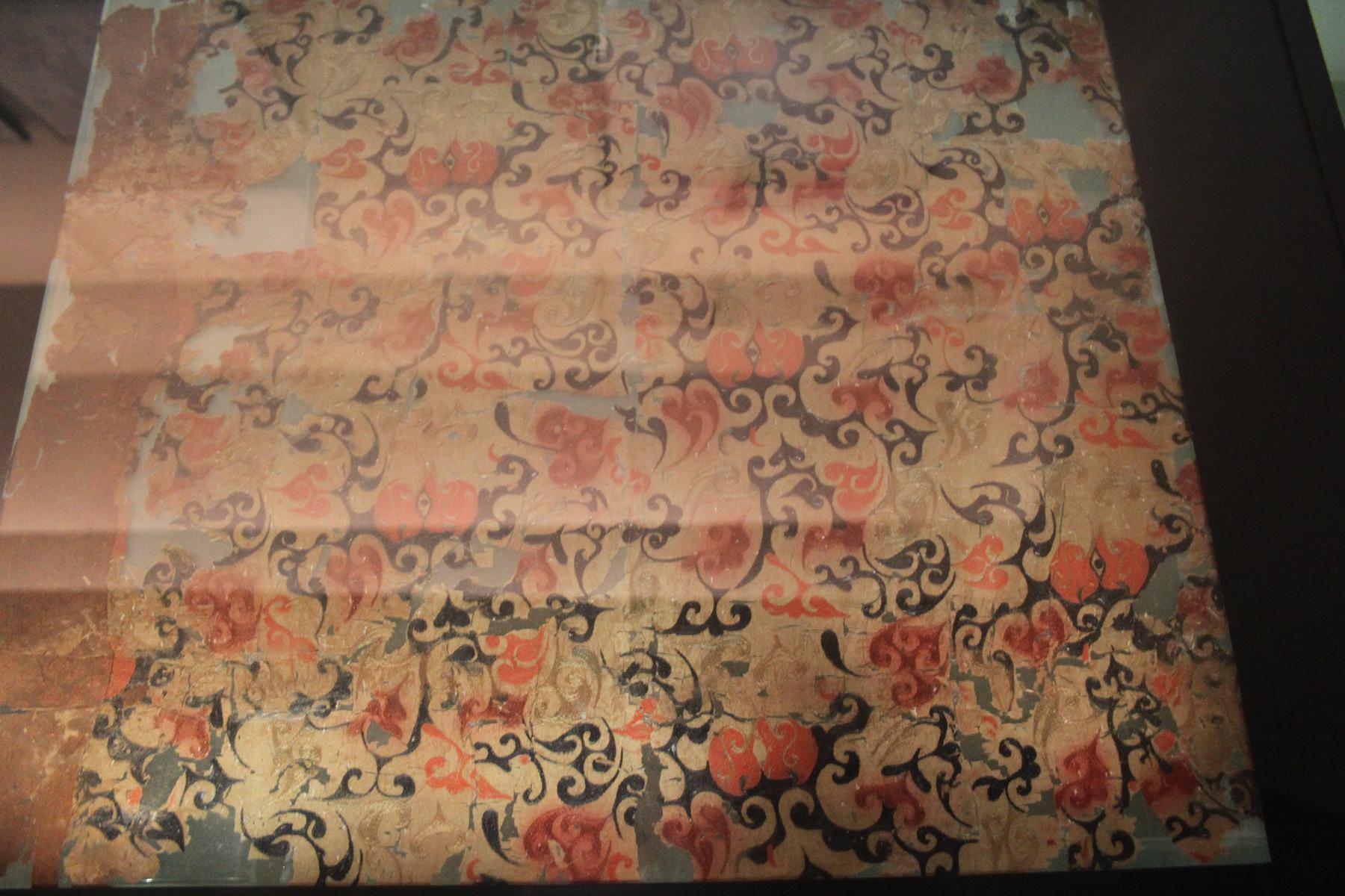 a piece of paper with a picture of a flower - File:Mawangdui Han Embroidered Fabric (10112503846).jp